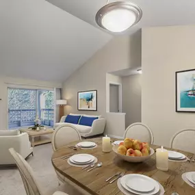 Dining and living area showing private balcony with sliding glass doors