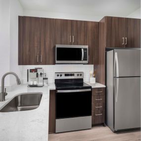 camden san marcos apartments scottsdale az kitchen with quartz countertops and stainless steel appliances