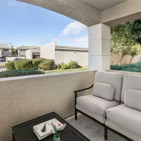 Camden San Marcos Apartments Scottsdale AZ covered balcony with space for a sofa and coffee table