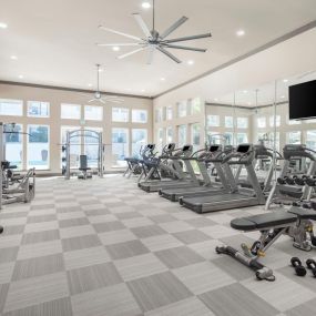 24-hour fitness center overlooking the pool at Camden La Frontera