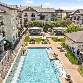 Aerial view of resort style pool and sundeck at Camden La Frontera