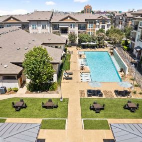 Aerial view of resort style pool and poolside outdoor lounge