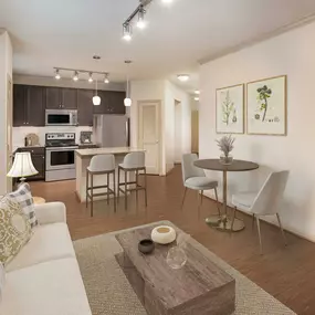 Open-concept living room and kitchen with dining area at Camden La Frontera