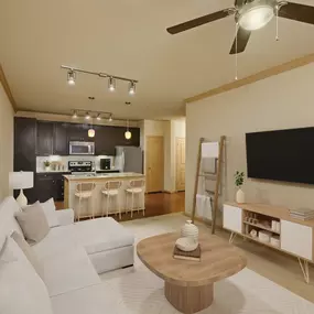 Open-concept living room and kitchen at Camden La Frontera apartments in Round Rock, TX