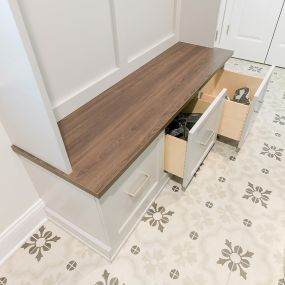 Your entryway or mudroom is the first area your guests see and the perfect place to make a great impression. Efficient home storage can transform piles into smiles with neatly hung coast and orderly cubbies holding the items your family uses every day.