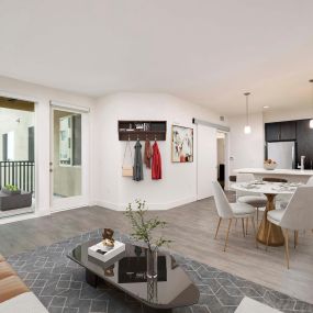 Open concept living room near kitchen and patio