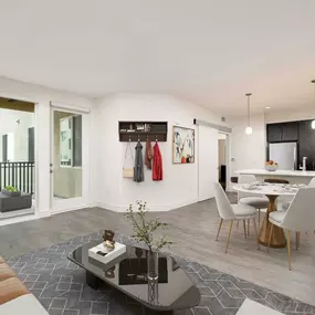 Open concept living room near kitchen and patio