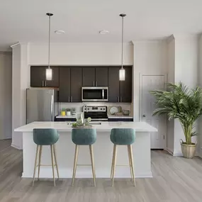 Kitchen with large island at Camden Plaza Apartments in Houston, TX