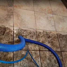 Technician performing tile cleaning in Omaha, NE