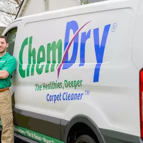 M.S. Chem-Dry tech standing by van