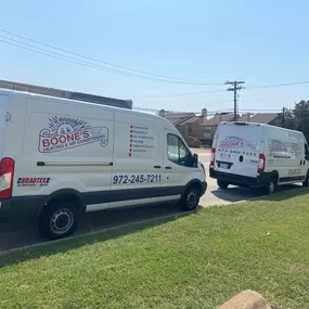 Boone's Heating and Cooling work trucks