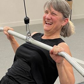 Middle aged woman strength training in San Luis Obispo