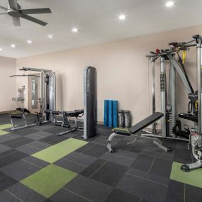 24-hour fitness center with strength machines at Camden Huntingdon apartments in Austin, TX