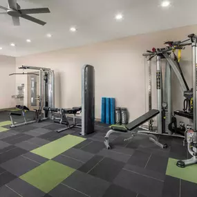 24-hour fitness center with strength machines at Camden Huntingdon apartments in Austin, TX