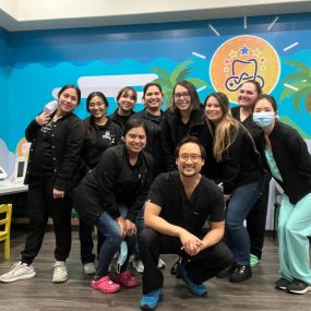 Dr. Anthony Vu with his team of Arcade Dental