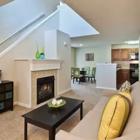 Traditional style open concept living dining kitchen with fireplace and loft