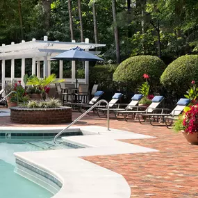 Relax by Camden Lake Pine's beautiful outdoor pool in Apex, NC