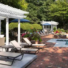 Relax by Camden Lake Pine's beautiful outdoor pool in Apex, NC