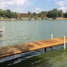 For those who don’t want to reinstall their docks every year, a permanent dock is an excellent solution to an annual trouble. These docks will be installed with permanent posts driven into the lake bottom. The decking choice is up to you from a standard wood deck to aluminum products or composite decking.