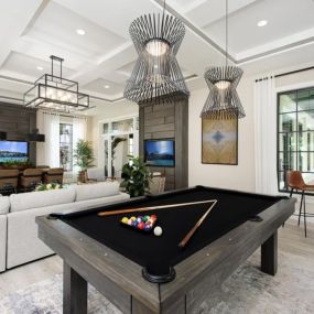Resident clubhouse with pool table at The Atlantic Palms at Tradition