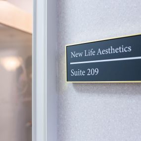 New Life Aesthetics in Raleigh NC - Front Door Sign