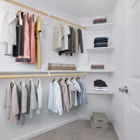 Walk-In closet with built-in shelving and storage at Camden Dunwoody in Atlanta GA