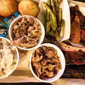 An OTB platter sure packs a punch! Order your favorite combination of smoked meats, signature sides, and delicious honey cornbread muffins.