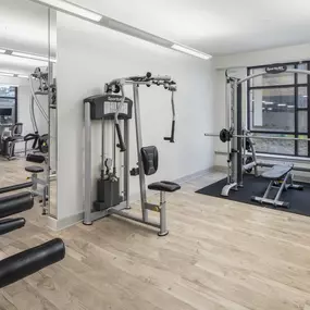 24 hour fitness center with strength and cardio equipment at Camden Post Oak Apartments in Houston, Tx