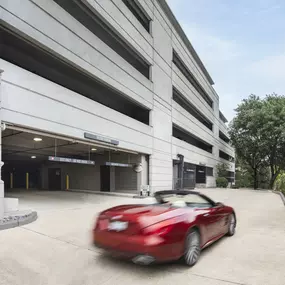 Access controlled covered parking garage at Camden Post Oak Apartments in Houston, Tx