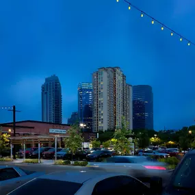 Uptown park shopping and dining near community at night