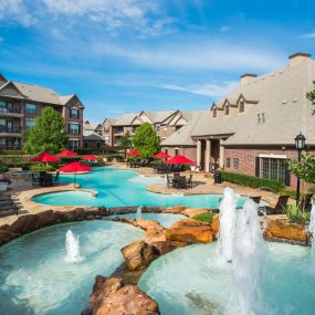 Resort-style pool with fountains at Camden Panther Creek in Frisco, TX