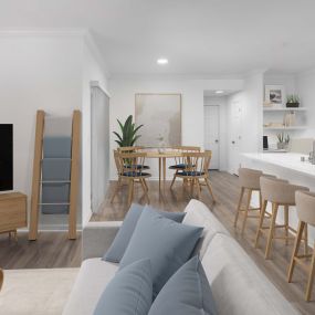 Living and dining area with wood-style floors at Camden Panther Creek apartments in Frisco, TX