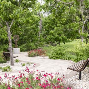 Local park with trail and bench close to Camden Panther Creek apartments in Frisco, TX