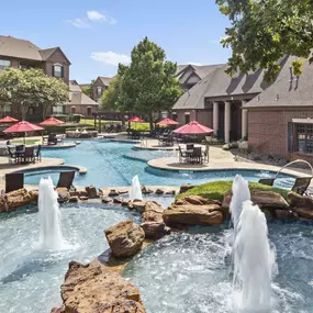 Resort-style pool with fountains at Camden Panther Creek in Frisco, TX