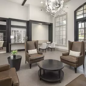 Resident lounge with seating at Camden Panther Creek apartments in Frisco, TX