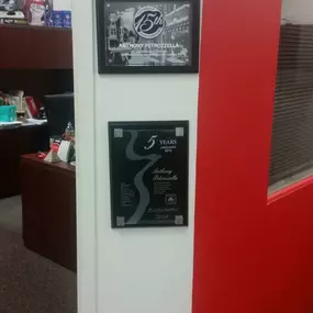 Proudly displaying our agency's plaques