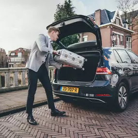 van Schiphol naar Amsterdam met Sixt share