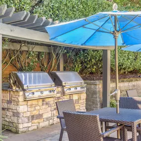 BBQ grills by the pool at Camden Sedgebrook