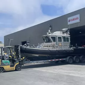 Sheriff's boat arriving for outboard repower.