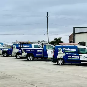 Trahan's Cooling, Heating & Plumbing work vans