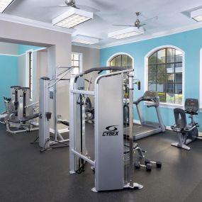 24-hour fitness center with strength training equipment