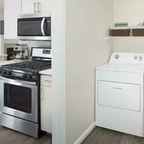 Laundry room with full size washer and dryer