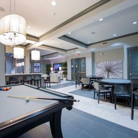 Midtown resident lounge with billiards poker tables kitchen and wifi