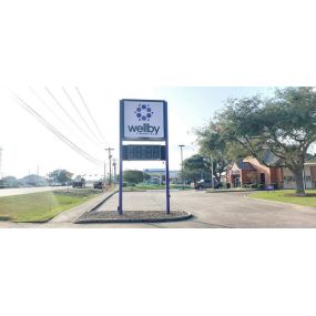 Exterior signage of Wellby Financial in League City West