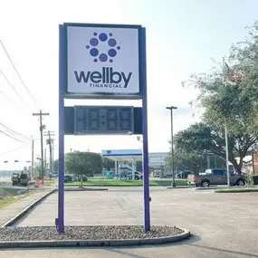 Exterior signage of Wellby Financial in League City West