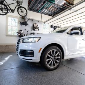 Start making the most of your garage by incorporating space-saving storage features that will declutter your area. We offer a variety of overhead storage racks, wall hanging systems, and accessories to elevate and bring order to your space.