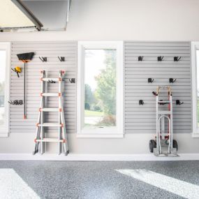 Your garage can store bulky items like lawn care accessories or ladders with ease when you have the right storage solution system in place.