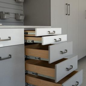 While we are completing our Spring cleaning and saying hello to Summer, we encourage you to consider incorporating sleek drawers and custom handles to your garage space designs. Our team can provide organization options that come in on-trend finishes and styles.