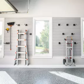 Your garage can store bulky items like lawn care accessories or ladders with ease when you have the right storage solution system in place.