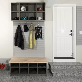 Ready to redo your garage? Think outside the box! We installed new Storage in this garage—and it comes complete with cubbies for shoes, hats, and gear, plus a place to put your jackets!